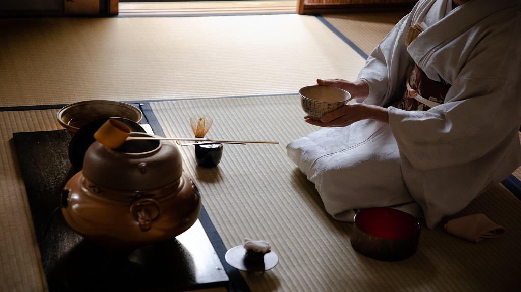 Japanese Woman Cradling Bowl in Tea Ceremony