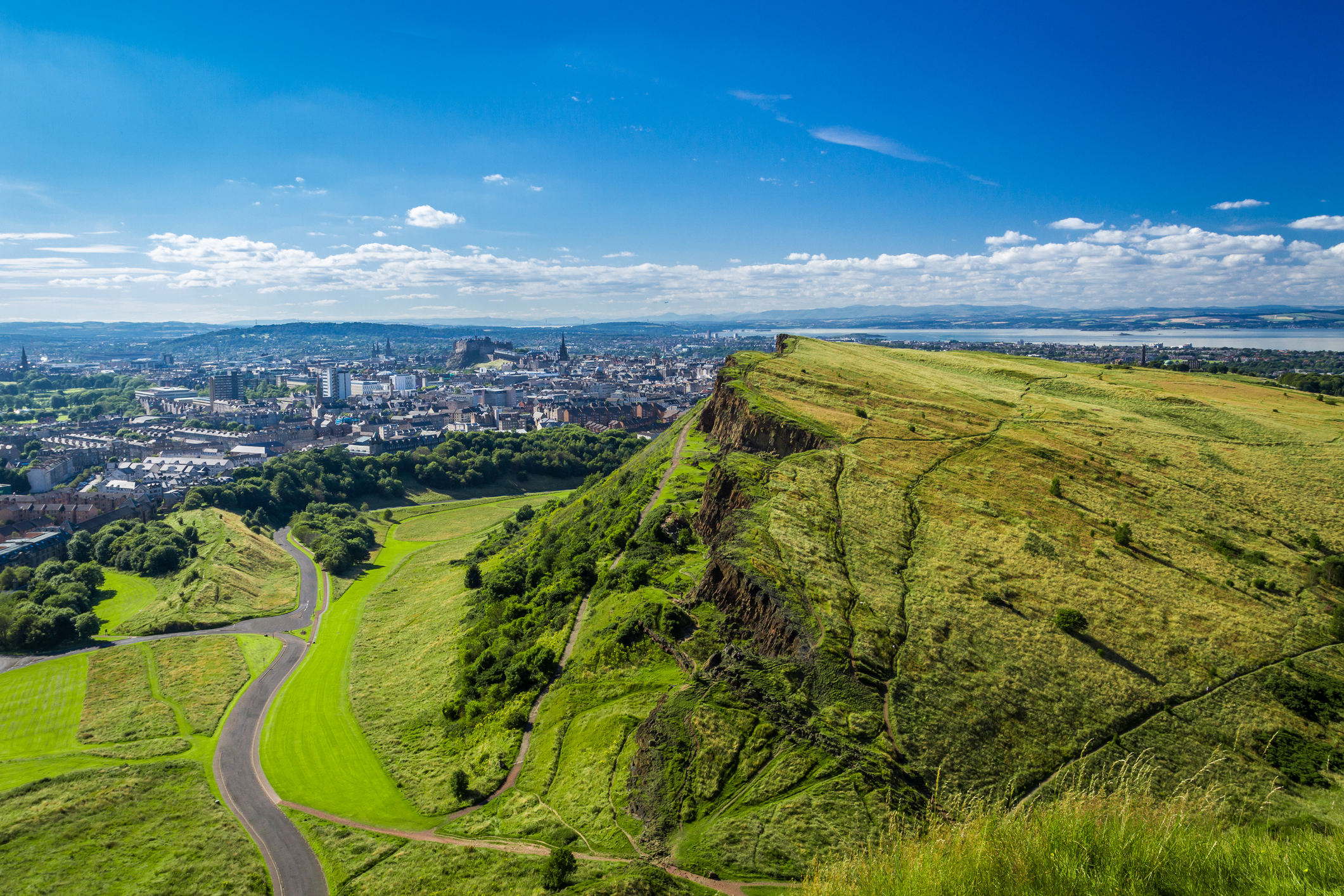 Edinburgh and green hills in summer