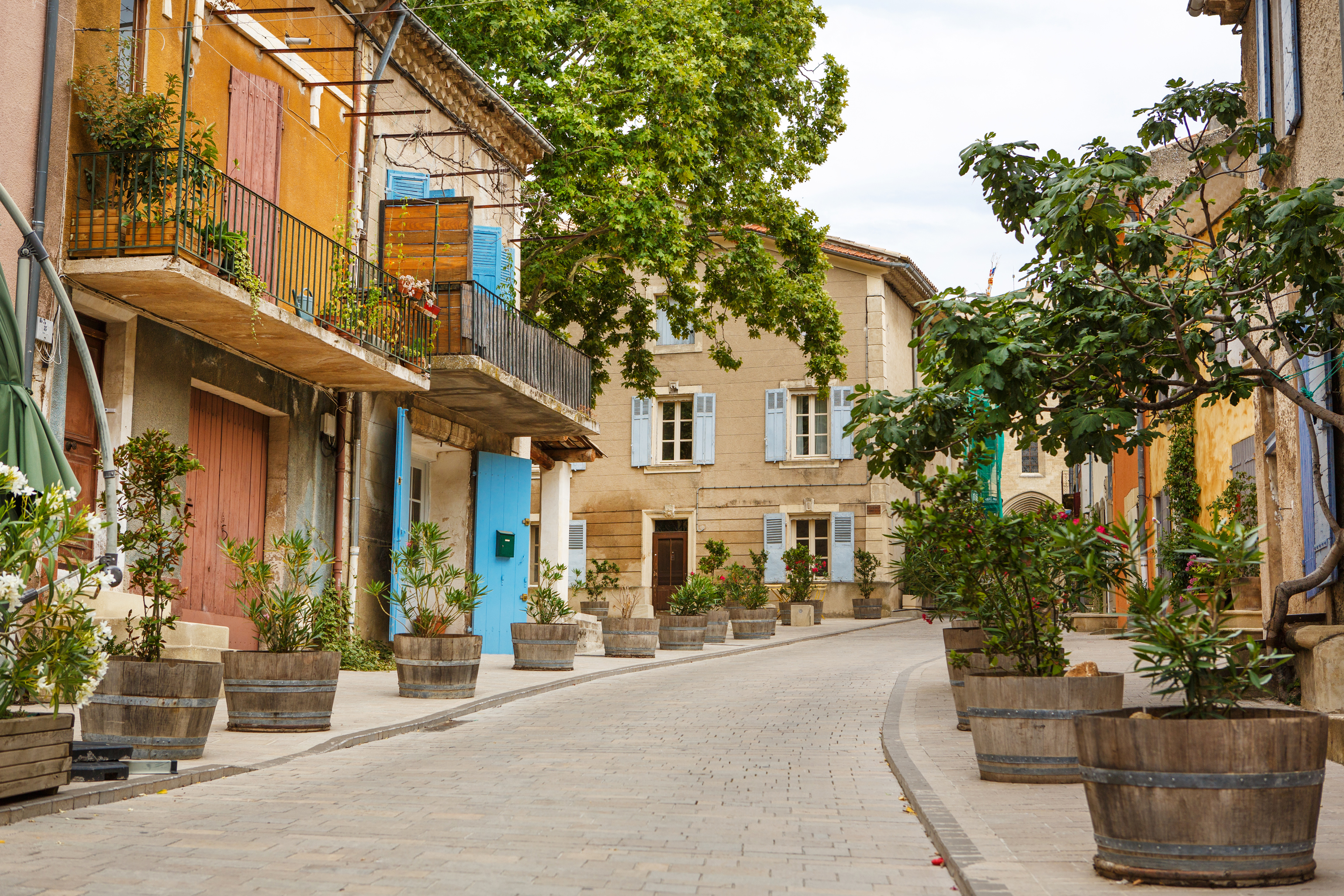 Provencal street with typical houses in southern France, Provenc Provencal street with typical houses in southern France, Provenc
