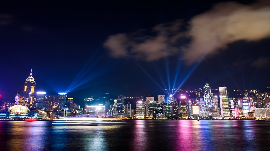 Laser show over Hong Kong cityscape at downtown modern building area