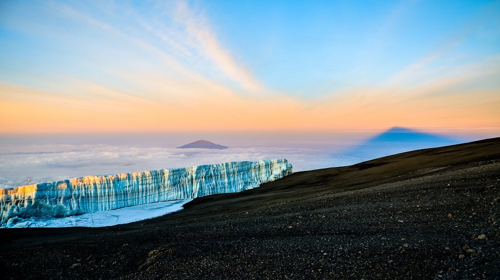 Sunrise at Kilimanjaro with glacier and Mount Meru – Tanzania Sunrise at Kilimanjaro with glacier and Mount Meru – Tanzania