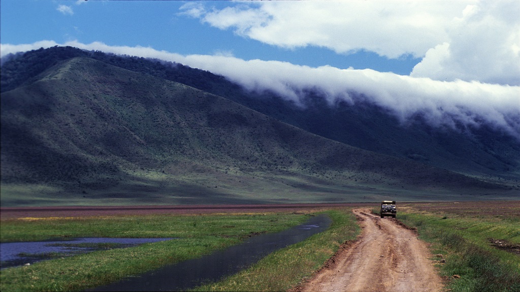Safari car in the rough track inside Ngorongoro Crater, Tanzania