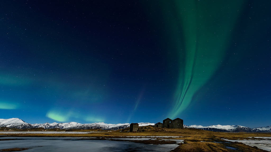 Amazing Aurora Borealis. The Northern Light at the mountain in Iceland Amazing Aurora Borealis. The Northern Light at the mountain in Iceland