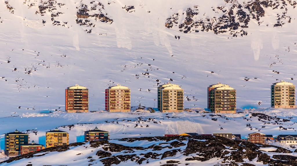 Greenlandic multistorey living buildings with mountains in the background, Nuuk, Greenland Greenlandic multistorey living buildings with mountains in the background, Nuuk, Greenland