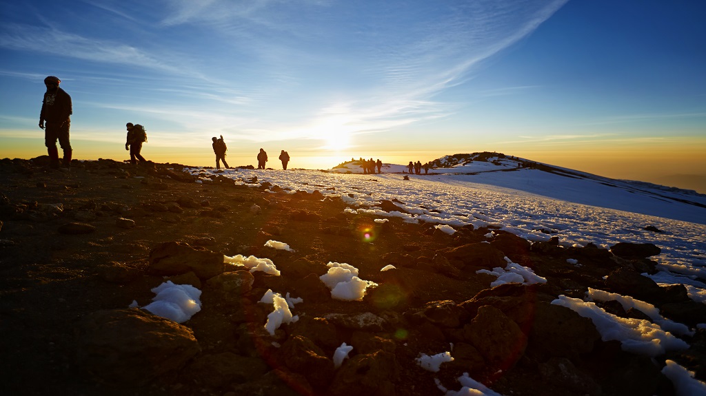 Mt Kilimanjaro route to the summit, a number of people climb the last stretch to the top Mt Kilimanjaro route to the summit, a number of people climb the last stretch to the top
